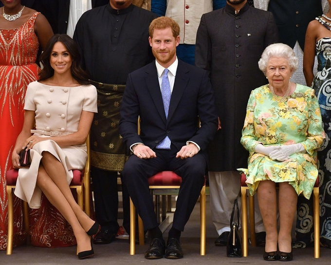 Vợ chồng Harry - Meghan và Nữ hoàng Anh tại một sự kiện ở London hồi tháng 6/2018. Ảnh: AFP.